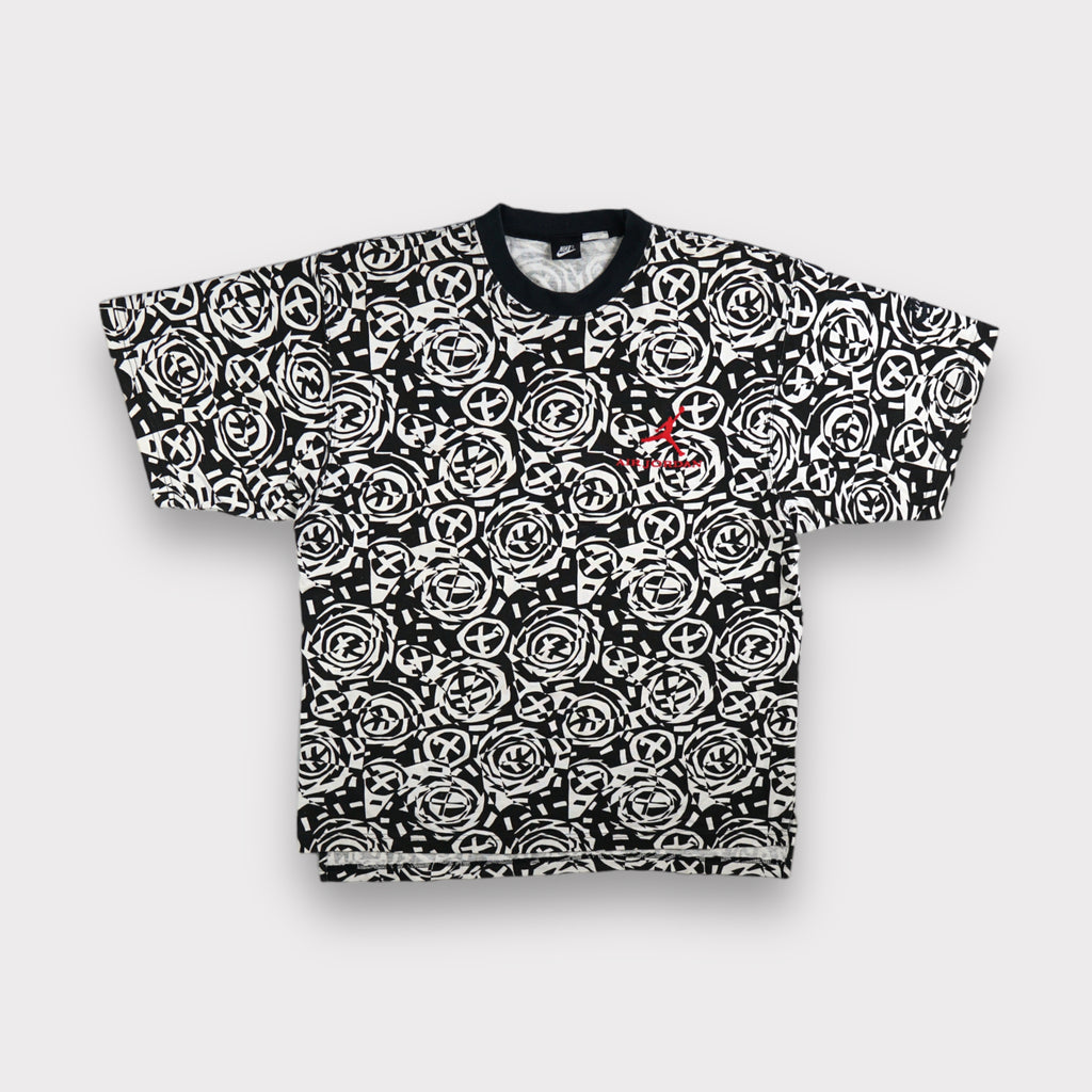Jordan T-Shirt in white and black with all-over geometric pattern and red chest logo