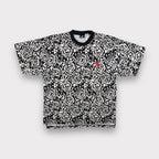 Jordan T-Shirt in white and black with all-over geometric pattern and red chest logo