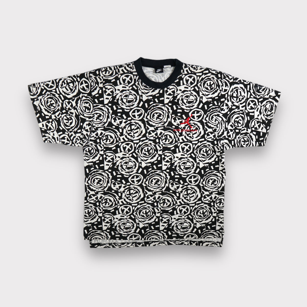 Jordan T-Shirt in white and black with all-over geometric pattern and red chest logo