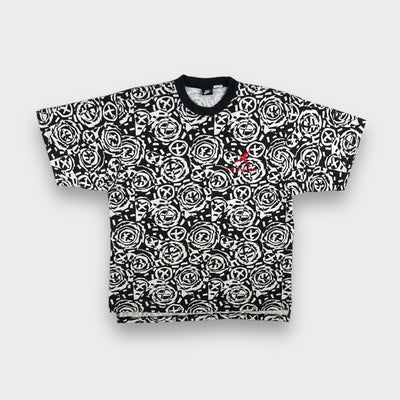 Jordan T-Shirt in white and black with all-over geometric pattern and red chest logo