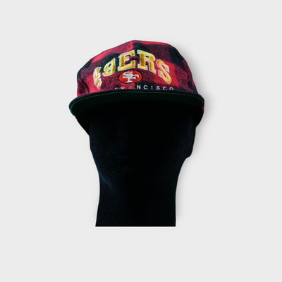 Red San Francisco 49ers snapback cap with buffalo check pattern and front embroidery