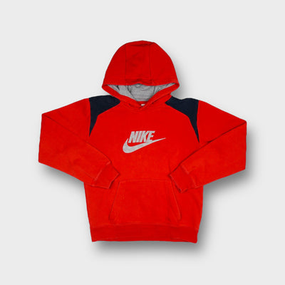 Nike pullover hoodie in red featuring a printed grey swoosh logo and contrasting shoulders