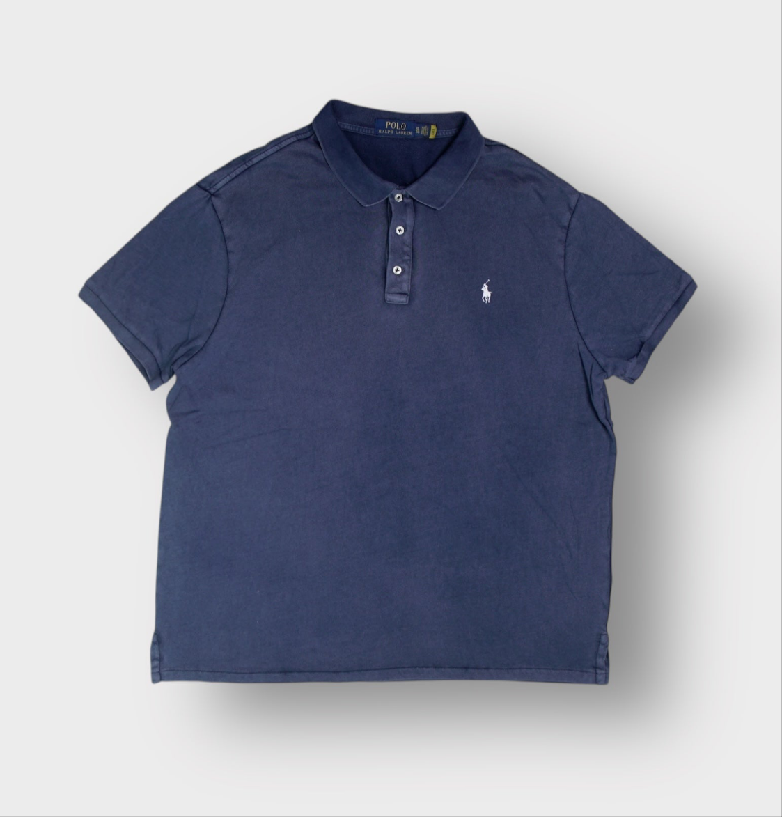 Ralph Lauren polo shirt in blue with white embroidered pony logo on the chest