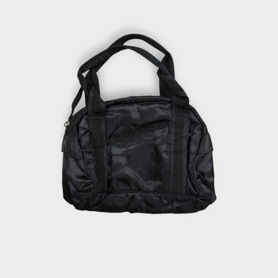 Nike handbag in black featuring an embroidered logo on the front panel and top handles.