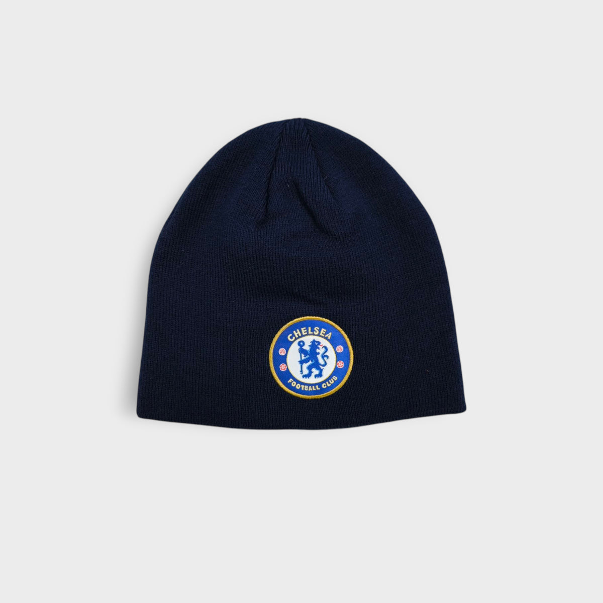 Chelsea FC beanie in navy blue featuring an embroidered crest patch on the front
