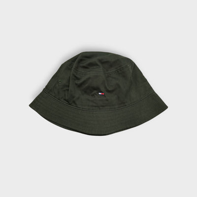 Dark green Tommy Hilfiger bucket hat featuring a small embroidered flag logo