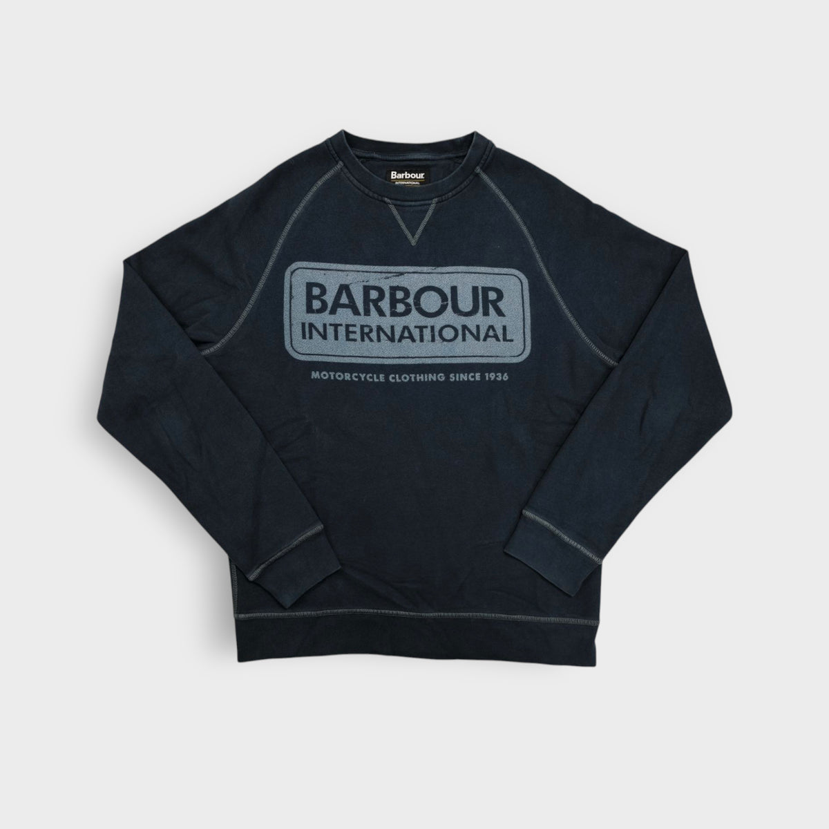 Barbour International navy blue sweater with printed motorcycle chest logo and V-notch neck detail
