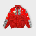 Michael Schumacher racing jacket in red with checkered pattern and F1 graphics.