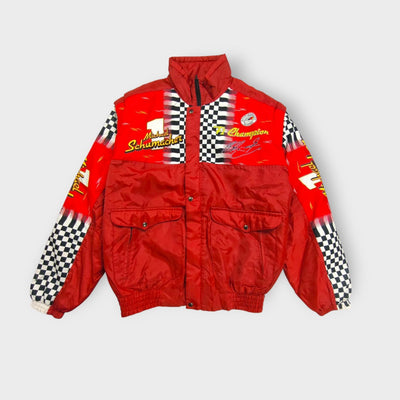 Michael Schumacher racing jacket in red with checkered pattern and F1 graphics.