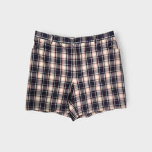 Load image into Gallery viewer, Lacoste beige plaid shorts featuring a metal crocodile detail at the waist
