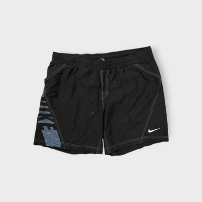 Nike black shorts featuring a graphic side design and small white swoosh logo