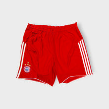 Load image into Gallery viewer, Adidas FC Bayern sports shorts in red featuring white side stripes and embroidered crest