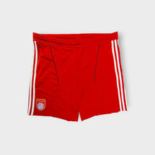 Load image into Gallery viewer, Red Adidas FC Bayern shorts with white stripes and an embroidered team crest
