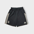Adidas Real Madrid black sports shorts featuring three white stripes and club crest