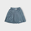 Adidas grey pleated skirt featuring an embroidered Trefoil logo near the hem