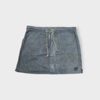 Nike blue denim-look skirt with a patterned drawstring tie and embroidered hem patch