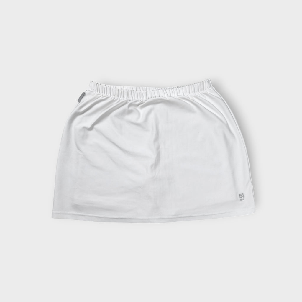 Nike white tennis skirt with elastic waistband and embroidered court logo at hem