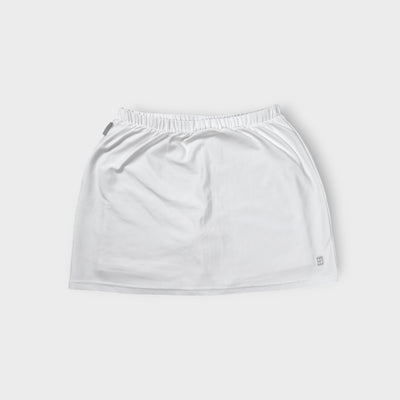 Nike white tennis skirt with elastic waistband and embroidered court logo at hem