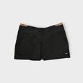 Nike skirt in black featuring a contrast tan waistband trim and embroidered white Swoosh