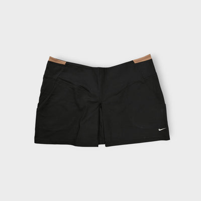 Nike skirt in black featuring a contrast tan waistband trim and embroidered white Swoosh