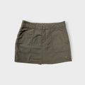 Nike ACG khaki outdoor skirt with small embroidered triangle logo on the hem