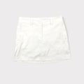 Nike Golf white athletic skirt featuring belt loops and side pockets.