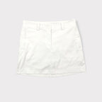 Nike Golf white athletic skirt featuring belt loops and side pockets.