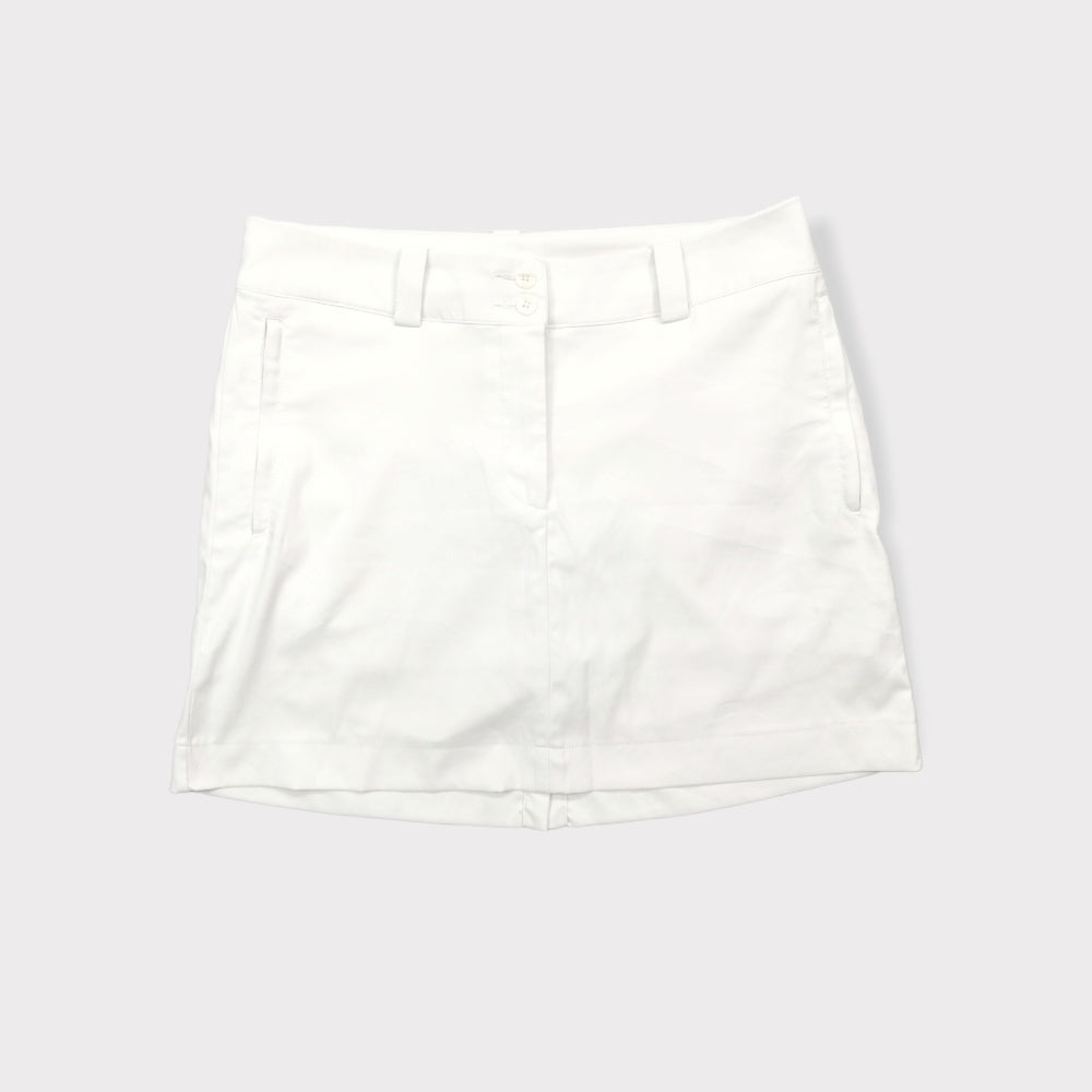 Nike Golf white athletic skirt featuring belt loops and side pockets.