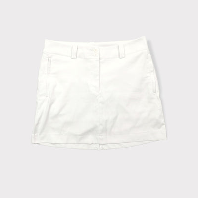 Nike Golf white athletic skirt featuring belt loops and side pockets.