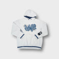 Here + There white hoodie featuring raised blue embroidered graffiti text across chest