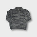 Lacoste knit sweater in marled grey with an open polo collar and crocodile logo patch.