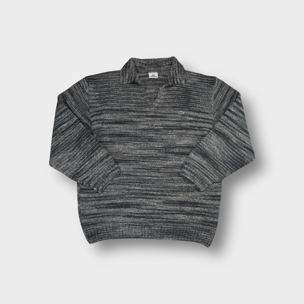 Lacoste knit sweater in marled grey with an open polo collar and crocodile logo patch.