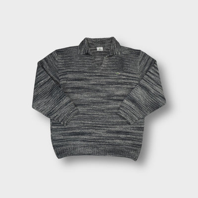 Lacoste knit sweater in marled grey with an open polo collar and crocodile logo patch.