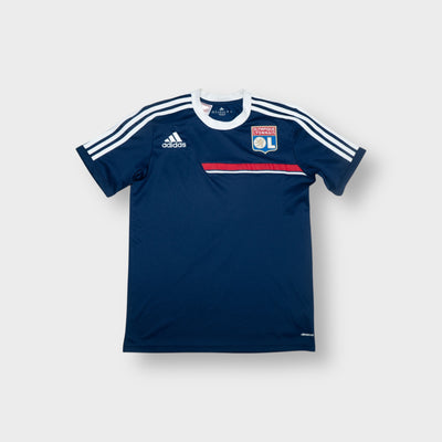 Adidas Olympique Lyonnais football shirt in navy blue with an embroidered club crest.