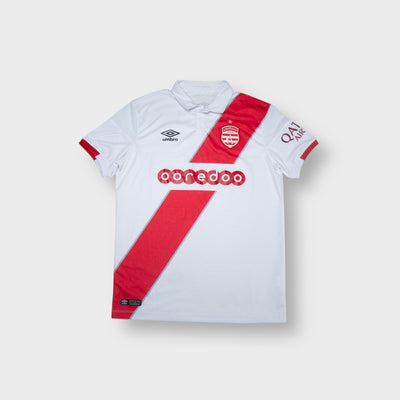 Umbro football jersey in white with a red diagonal sash and Club Africain crest