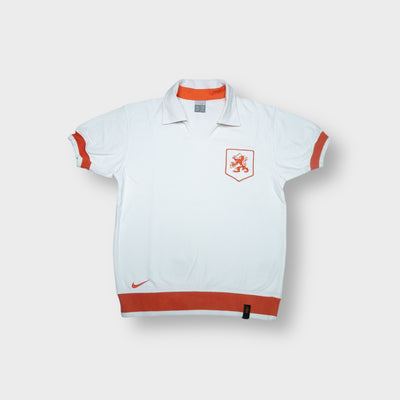 Nike Netherlands polo shirt in white featuring an orange KNVB lion crest