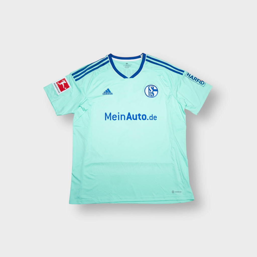 Adidas FC Schalke 04 jersey in turquoise with blue crest and sponsor print