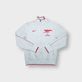 Nike Arsenal track jacket in white featuring red crest embroidery and piping details