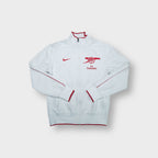 Nike Arsenal track jacket in white featuring red crest embroidery and piping details