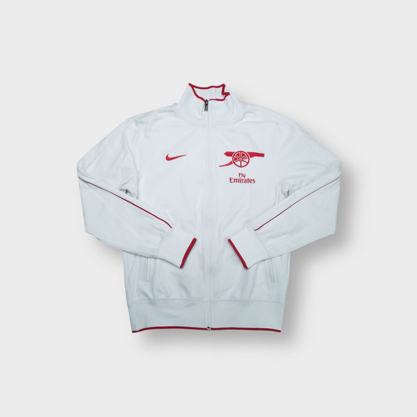 Nike Arsenal track jacket in white featuring red crest embroidery and piping details