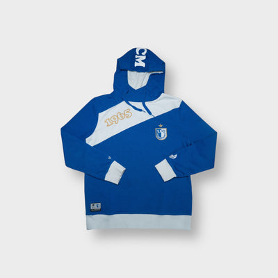 Uhlsport hoodie in blue featuring 1. FC Magdeburg crest and embroidered 1965 detail