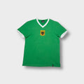 Copa Germany football T-Shirt in green with a central national crest patch and white V-neck trim.