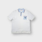 Vintage Adidas polo shirt in white with light blue collar and monogram chest pocket