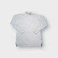 Grey Adidas turtleneck sweater featuring an embroidered equipment logo on the high collar.