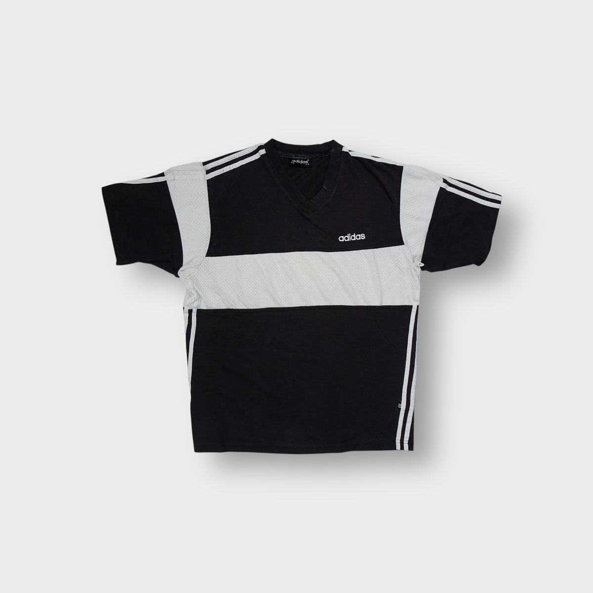 Adidas short-sleeve T-Shirt in black with white mesh inserts and V-neck collar