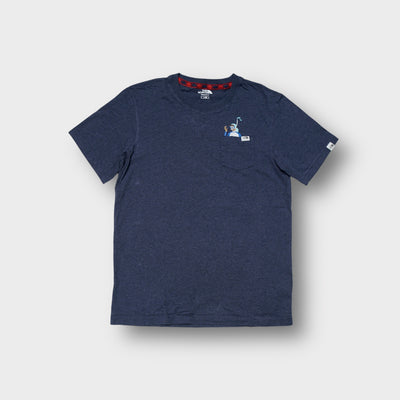 The North Face T-Shirt in heather blue with an embroidered snorkeler on the chest pocket.
