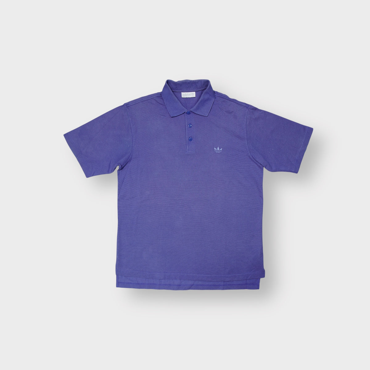 Adidas polo shirt in purple with embroidered trefoil logo on the chest