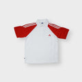 Adidas polo shirt in white with red raglan sleeves and three stripes