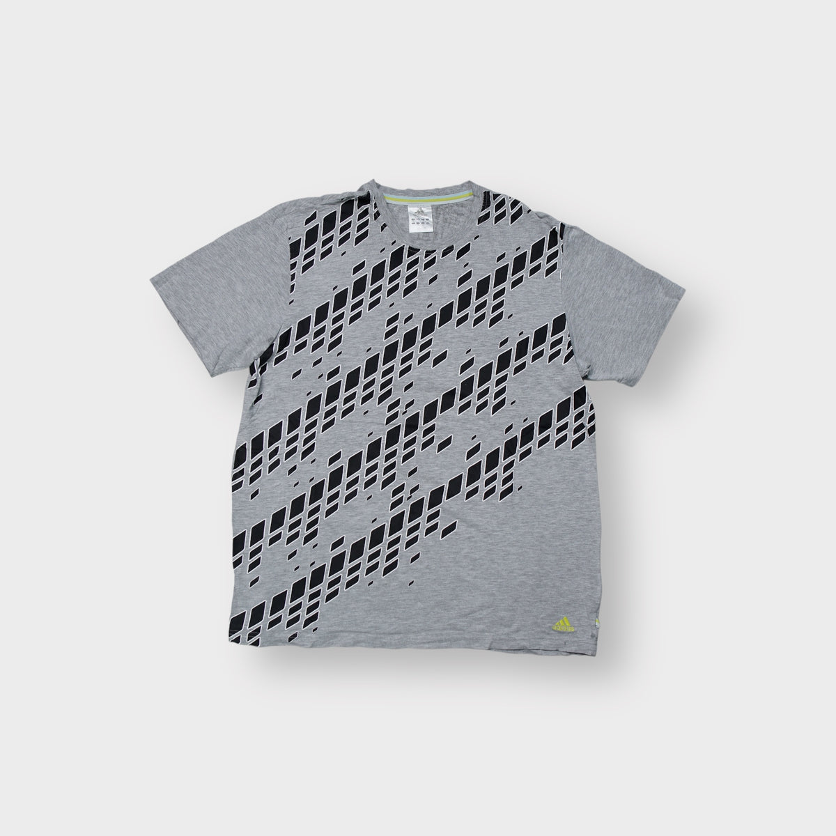 Grey Adidas T-Shirt featuring a black diagonal geometric diamond print across the front