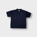 Reebok polo shirt in navy blue with red piping on collar and embroidered chest logo